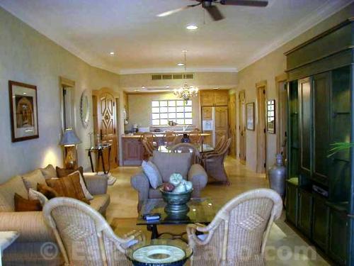 the living room opens up to the dining room and kitchen.  there is plenty of space to entertain family and friends in this villa